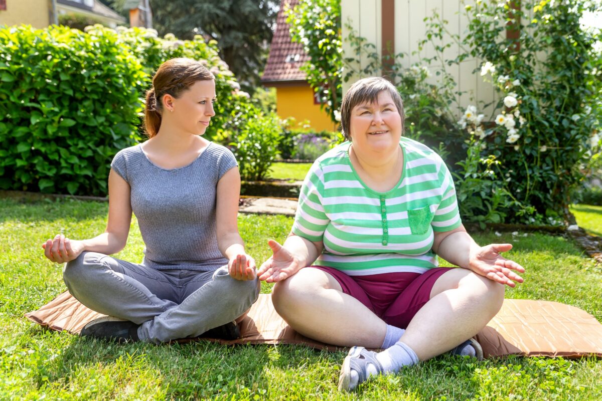 Case study image 2 women in garden meditating