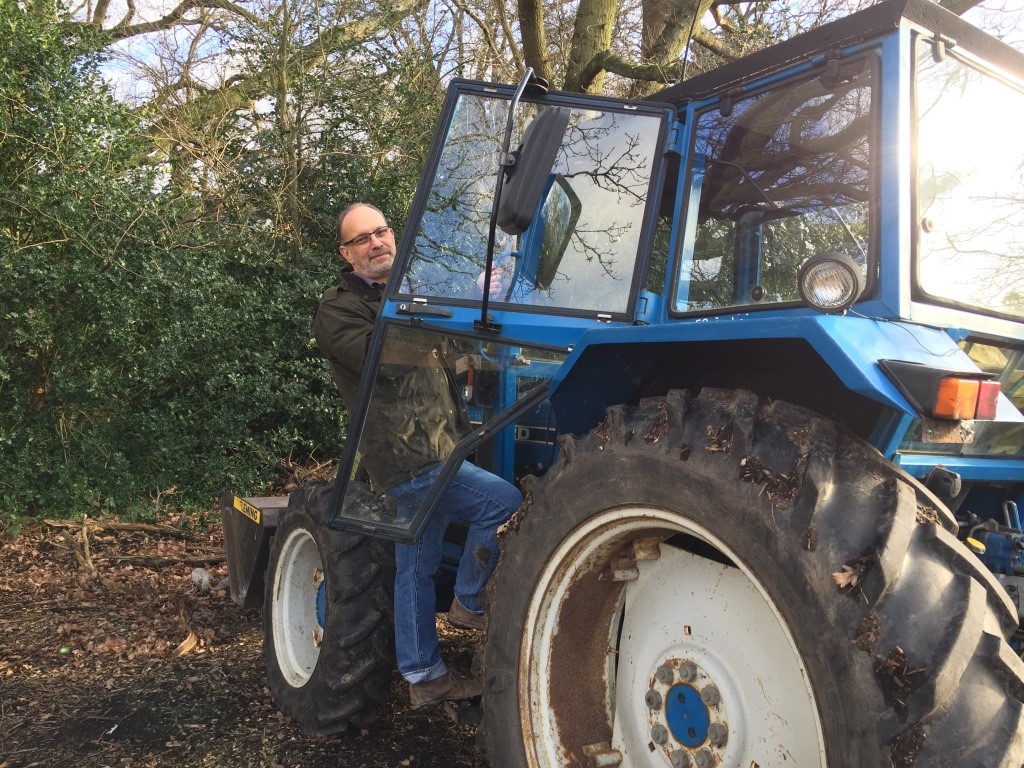 man on tractor in field